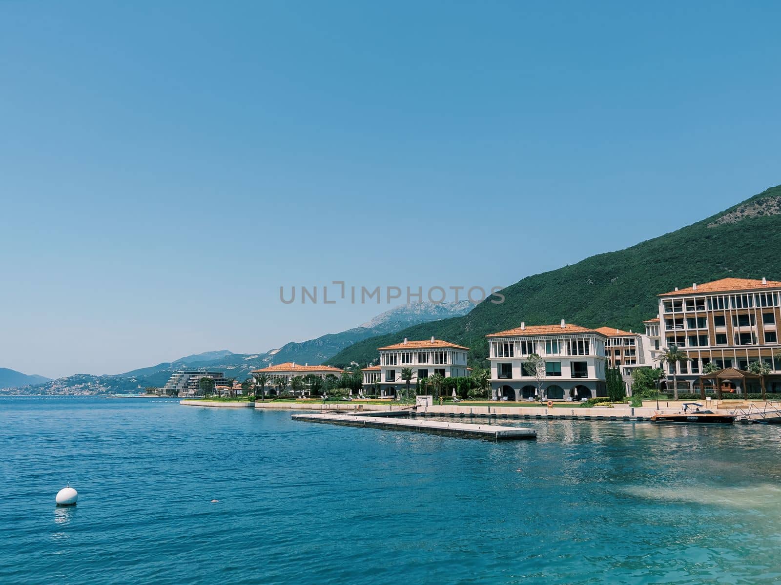 Hotel complex One and Only Portonovi at the foot of the mountains on the shore of the Bay of Kotor. High quality photo