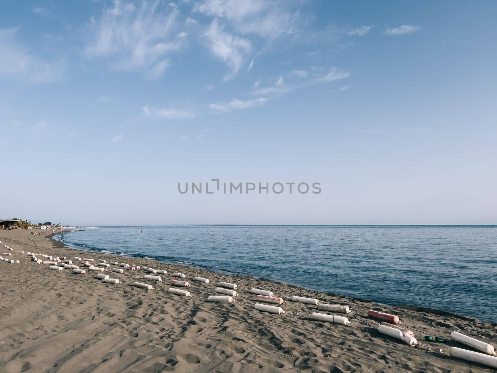 Boom dries on the sand by the blue sea. High quality photo