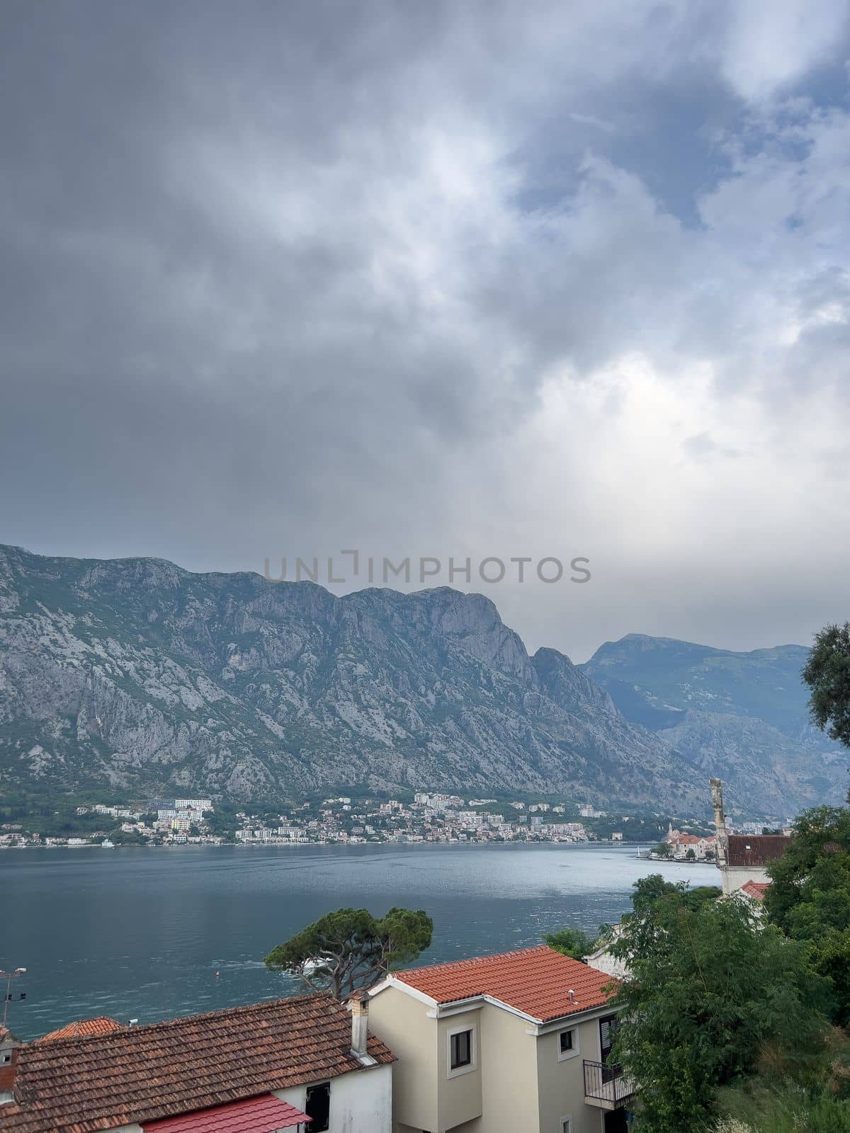 Stormy sky over the mountains and the Bay of Kotor. High quality photo