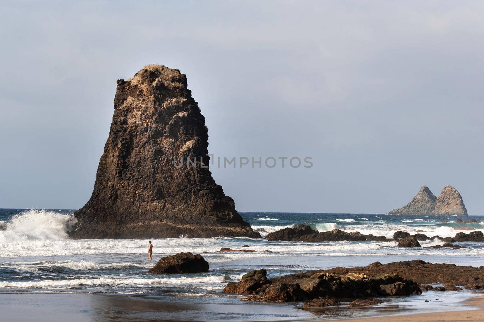 People on the sandy beach of Benijo on the island of Tenerife.Spain.