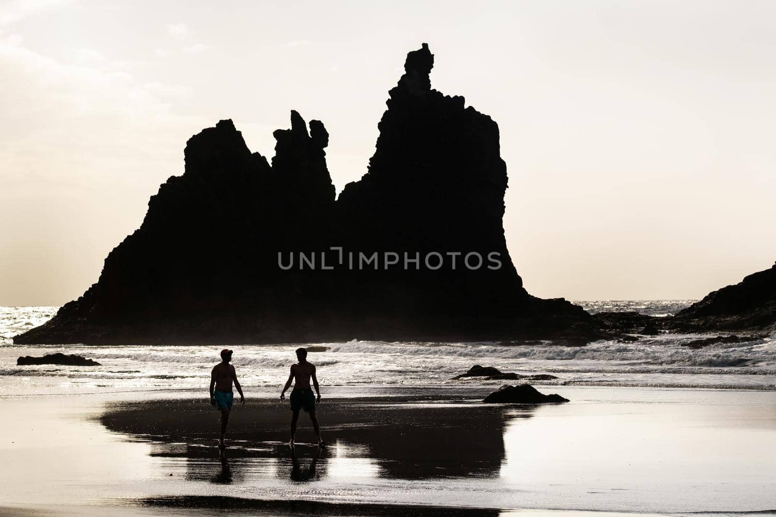 People on the sandy beach of Benijo on the island of Tenerife.Spain.