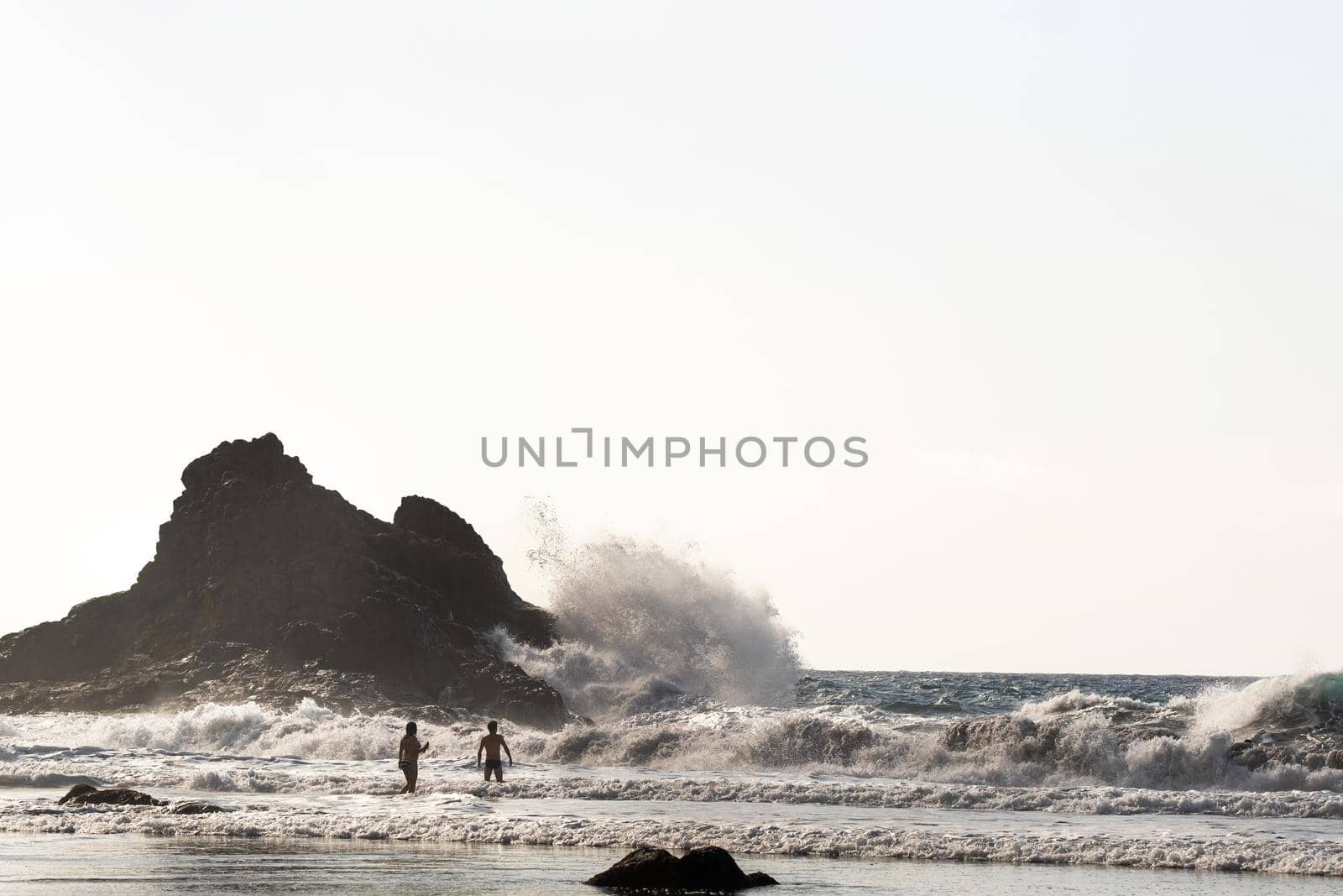 People on the sandy beach of Benijo on the island of Tenerife.Spain.