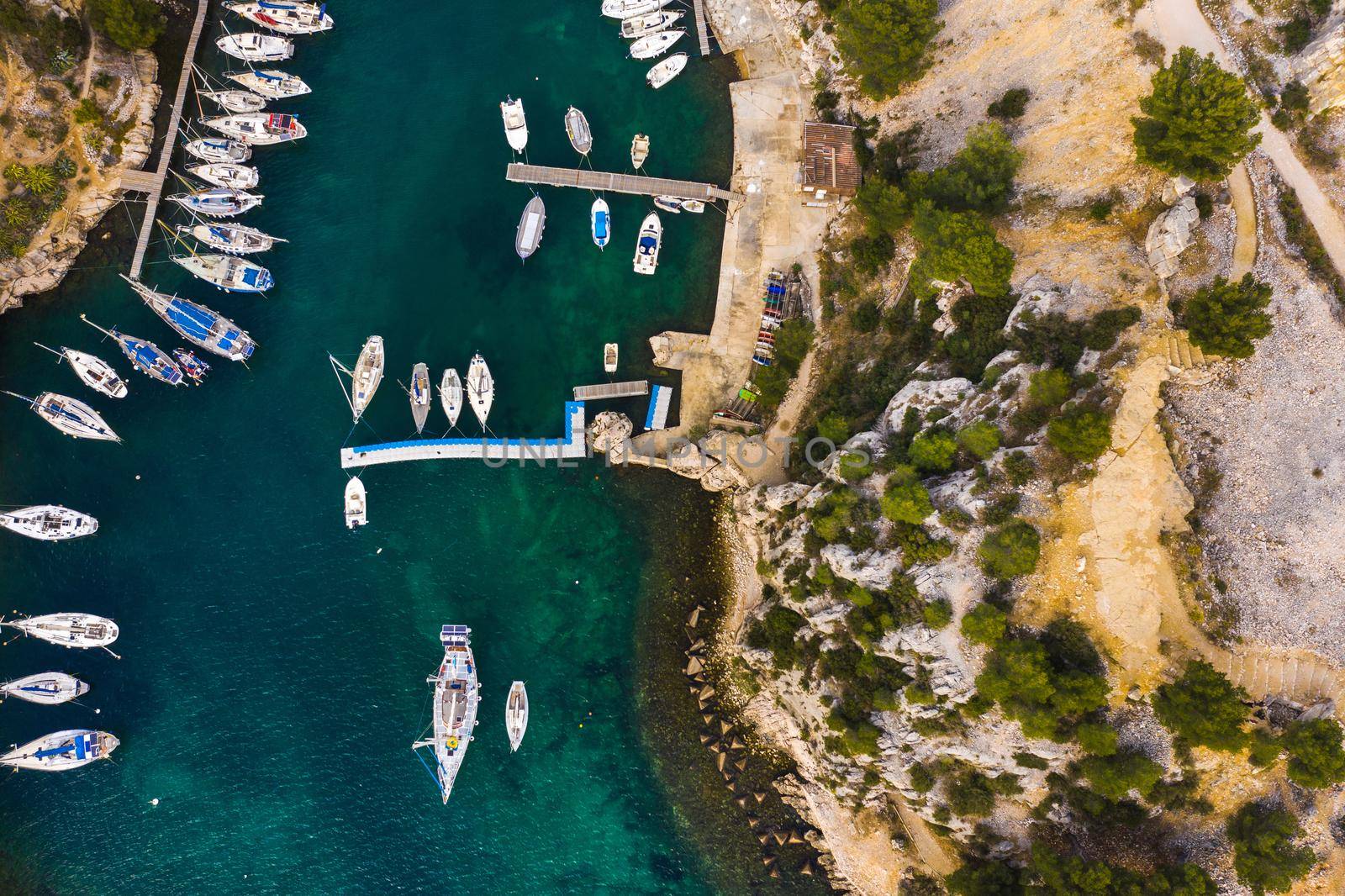 White yachts in Calanque de Port Miou, one of biggest fjords between Marseille and Cassis, France.