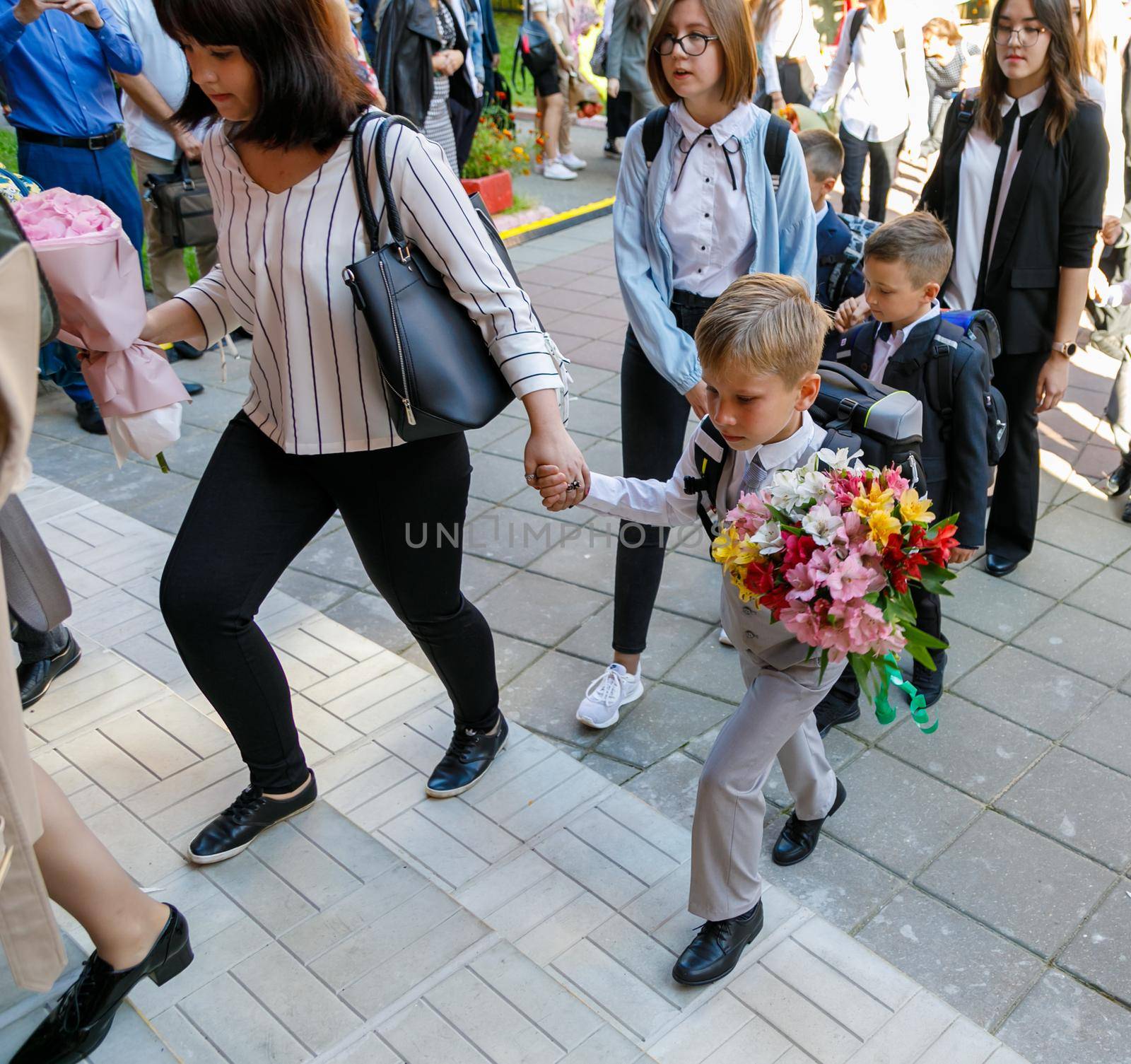 First graders with their parents go to school. First of September. School. First grade. Moscow, Russia, September 2, 2019