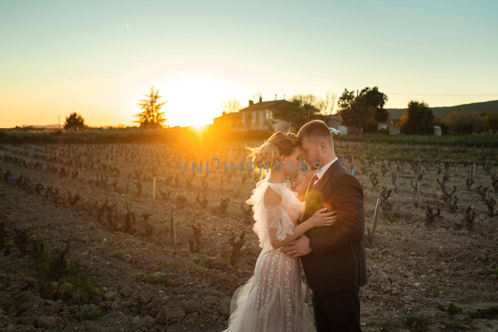 Wedding couple at sunset in France.Wedding in Provence.Wedding photo shoot in France.
