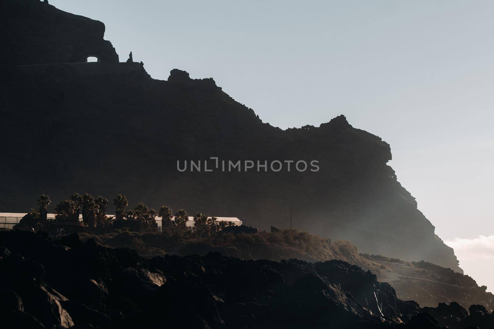 Tunnel through the mountain of Tenerife, Rocks at sunset near the Atlantic ocean of the island of Tenerife.Canary islands.Spain.