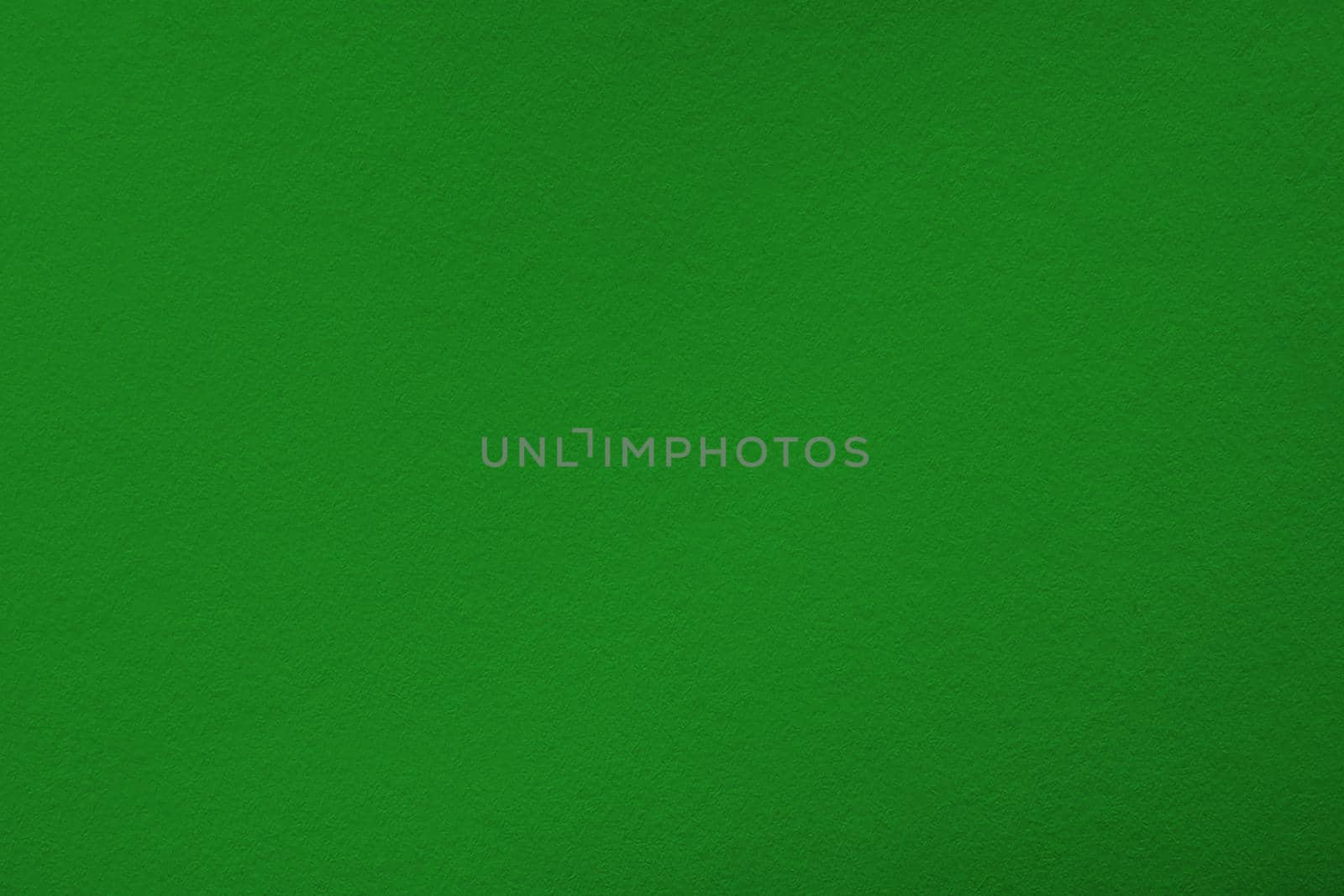 Green background with paper texture, horizontal, blank space.