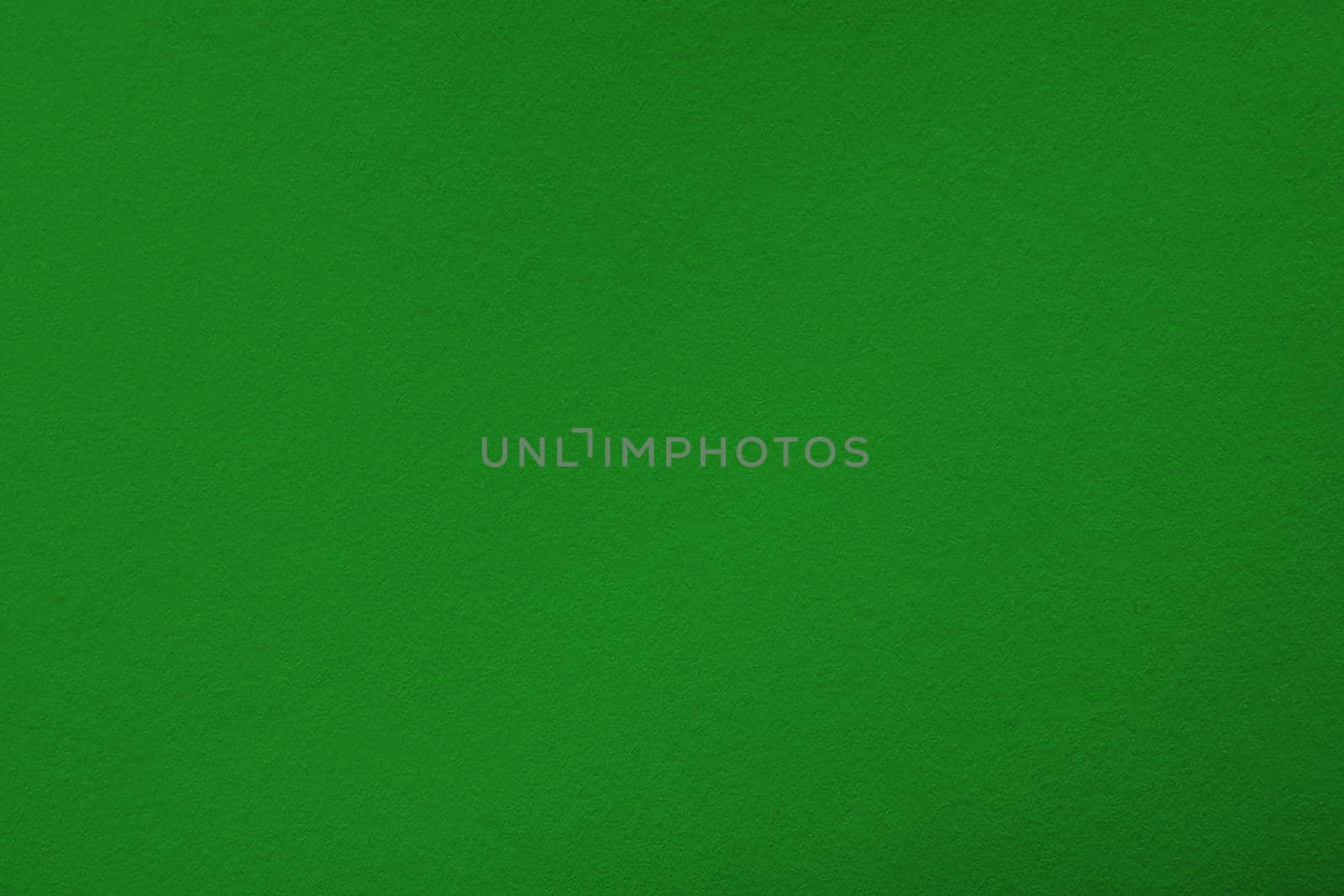 Green background with paper texture, horizontal, blank space.