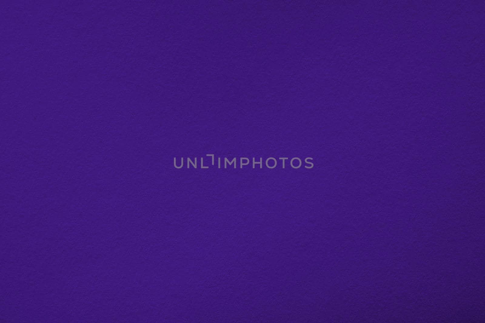 Purple background with paper texture, horizontal, blank space.