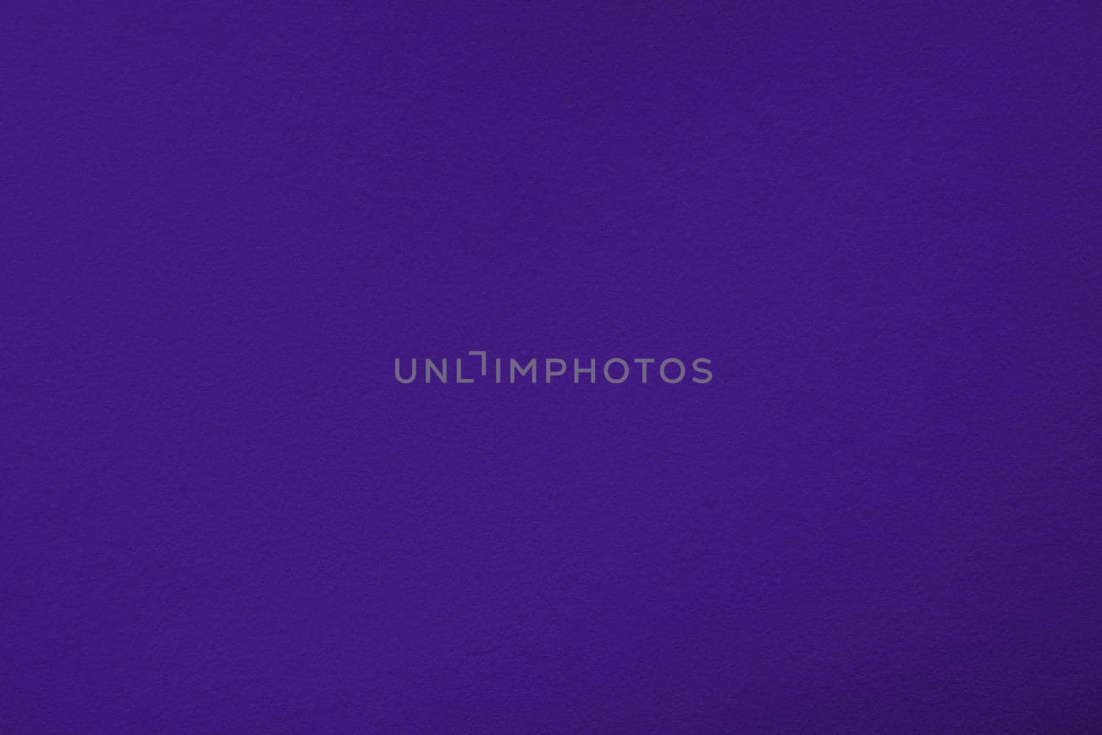 Purple background with paper texture, horizontal, blank space.