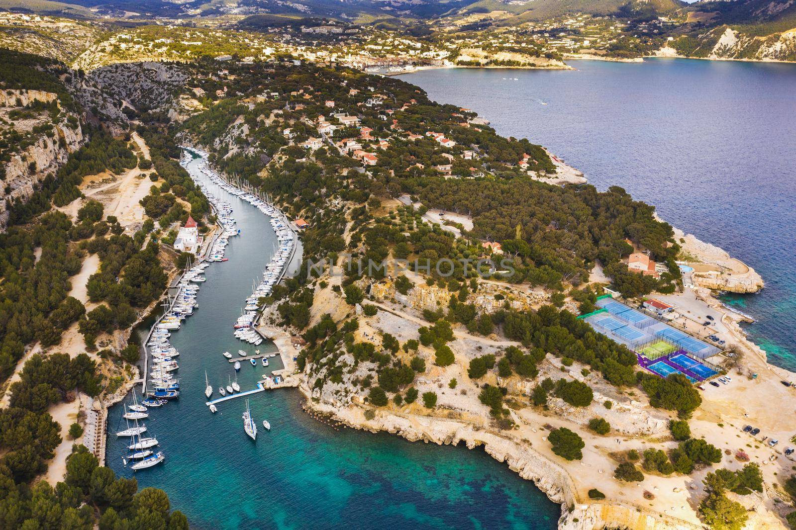 White yachts in Calanque de Port Miou, one of biggest fjords between Marseille and Cassis, France.