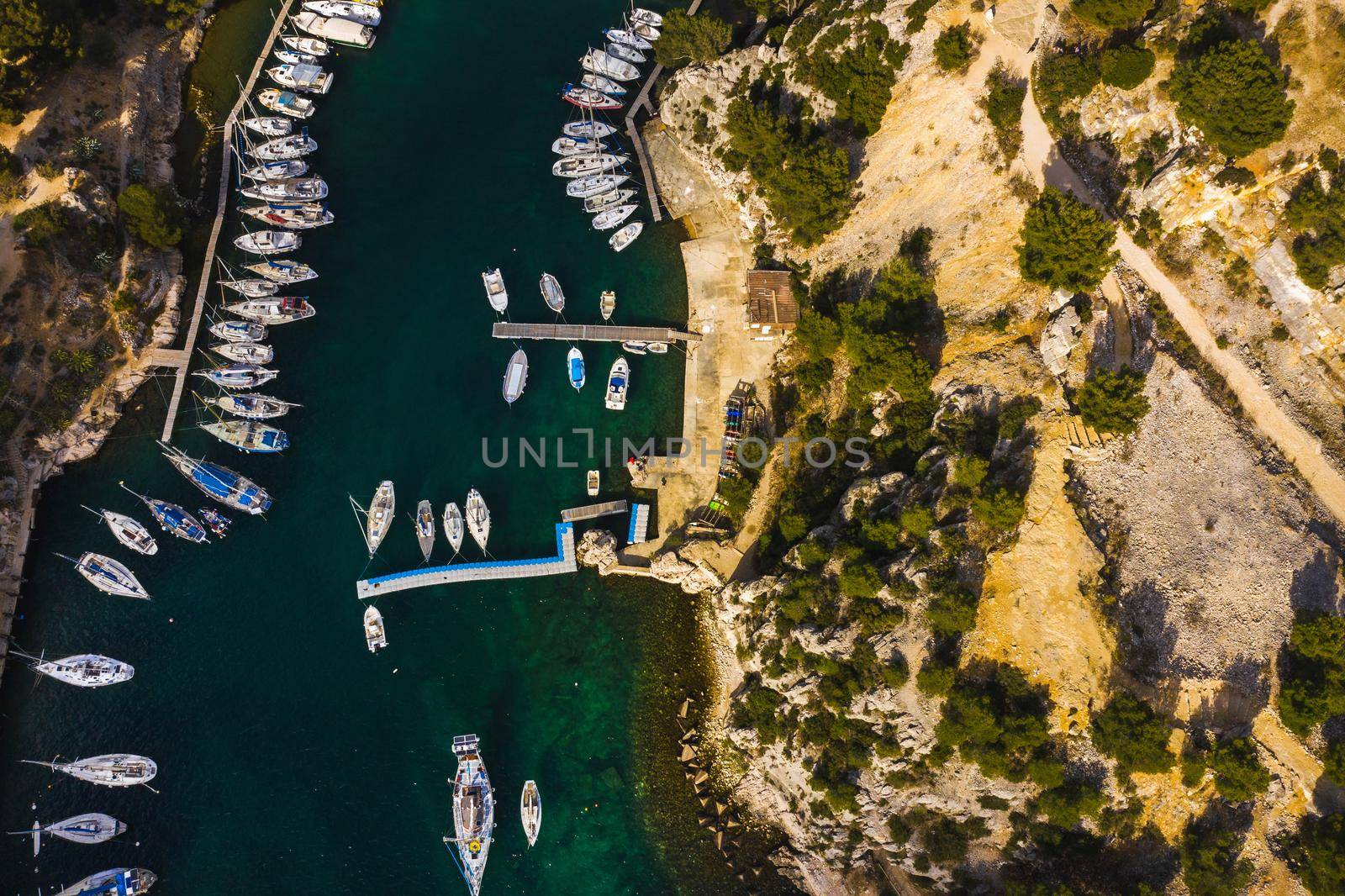 White yachts in Calanque de Port Miou, one of biggest fjords between Marseille and Cassis, France.