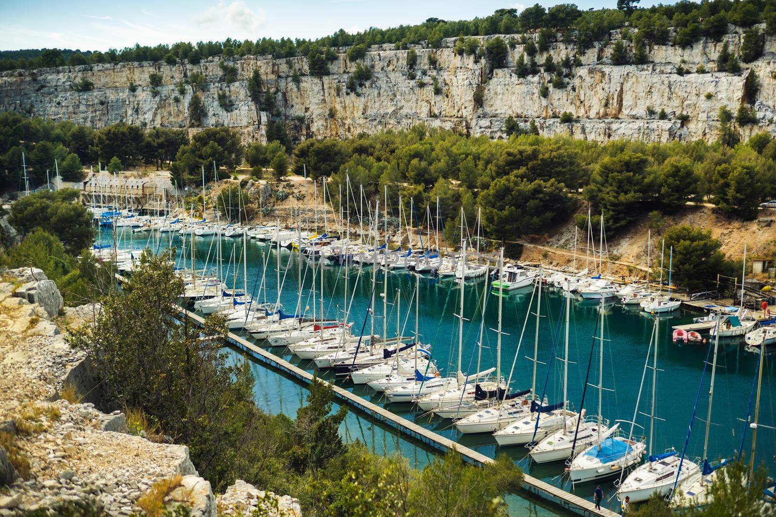 White yachts in Calanque de Port Miou, one of biggest fjords between Marseille and Cassis, France.