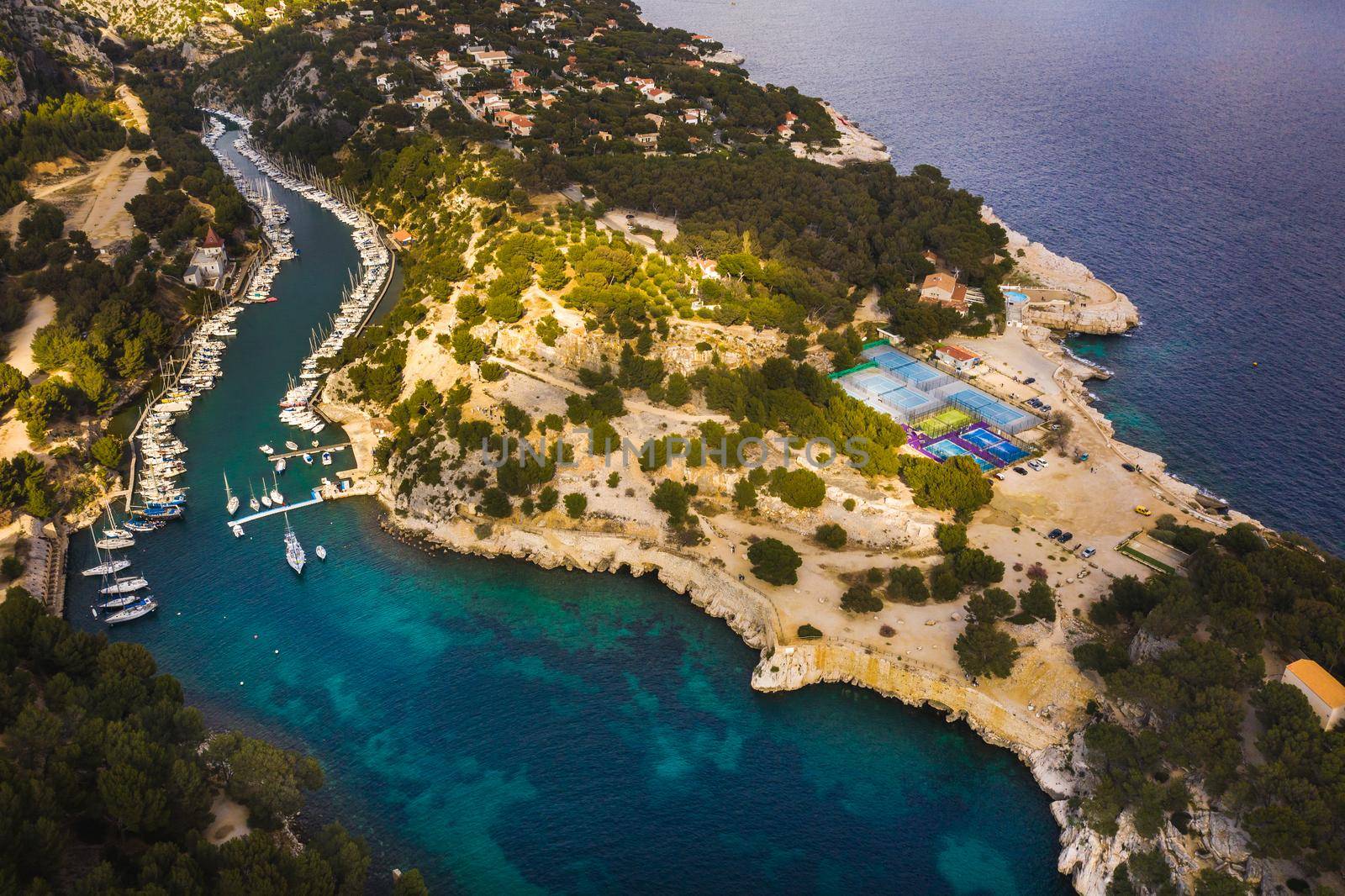 White yachts in Calanque de Port Miou, one of biggest fjords between Marseille and Cassis, France.