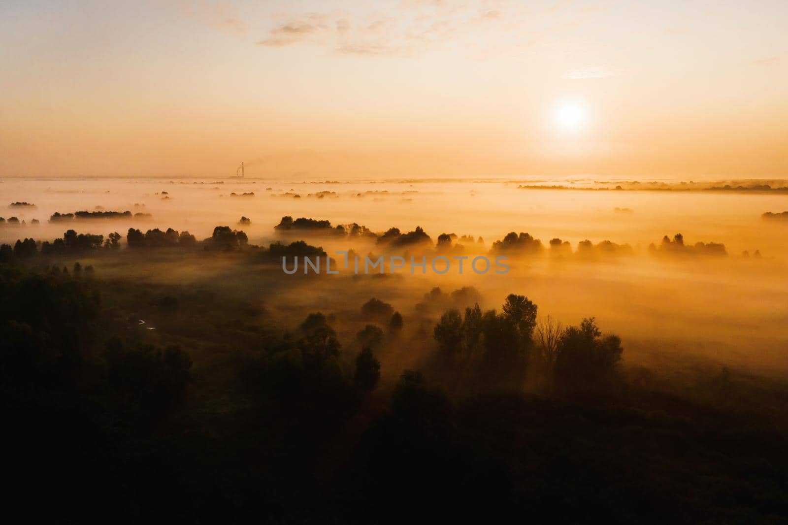 amazing sunrise in the countryside over forest expanses and fields. Amazing dawn in Ukraine and heights.Taking photos from a nature quadcopter.