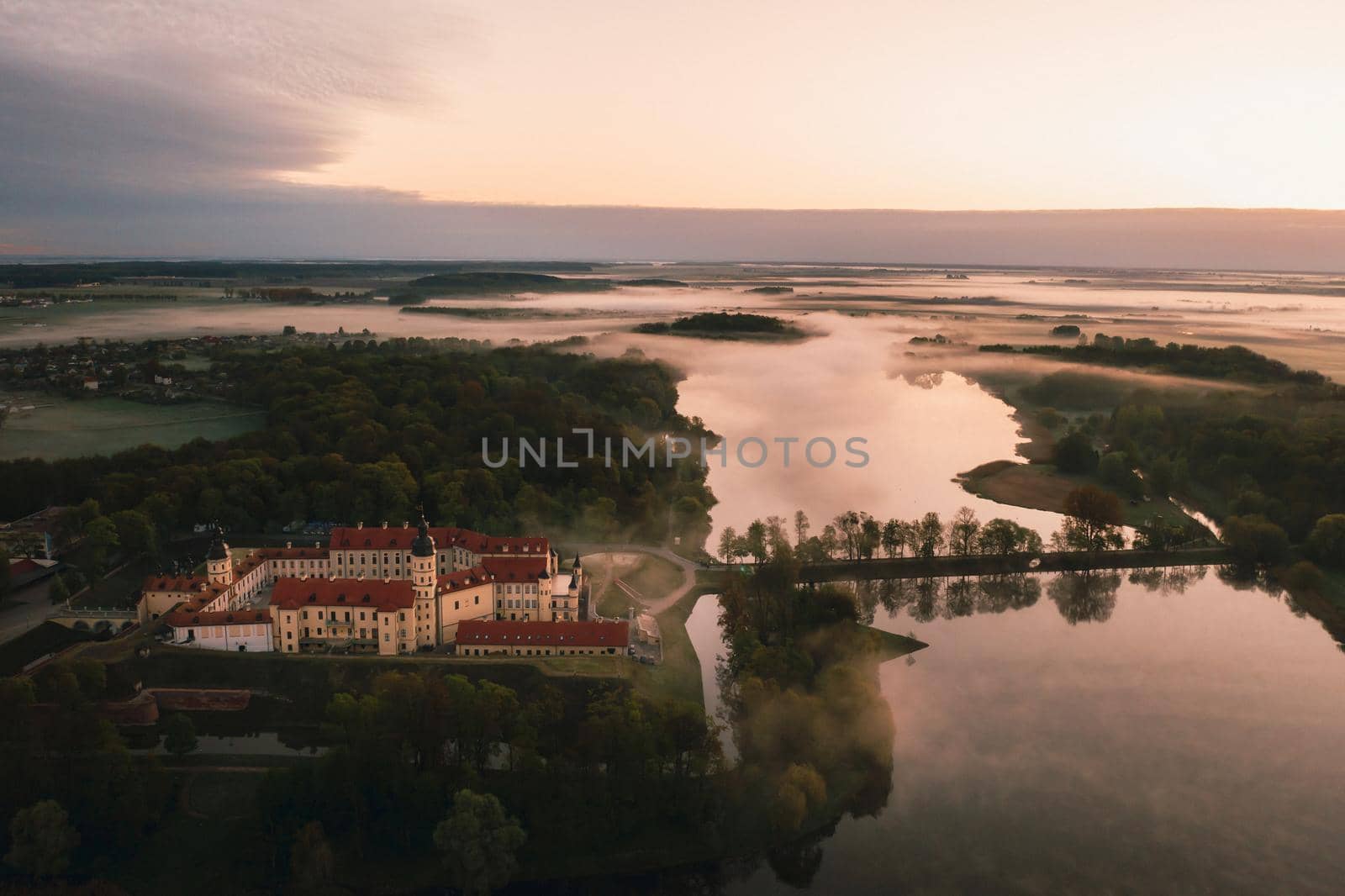 Nesvizh castle is a residential castle of the Radziwill family in Nesvizh, Belarus, with a beautiful view from above at dawn.