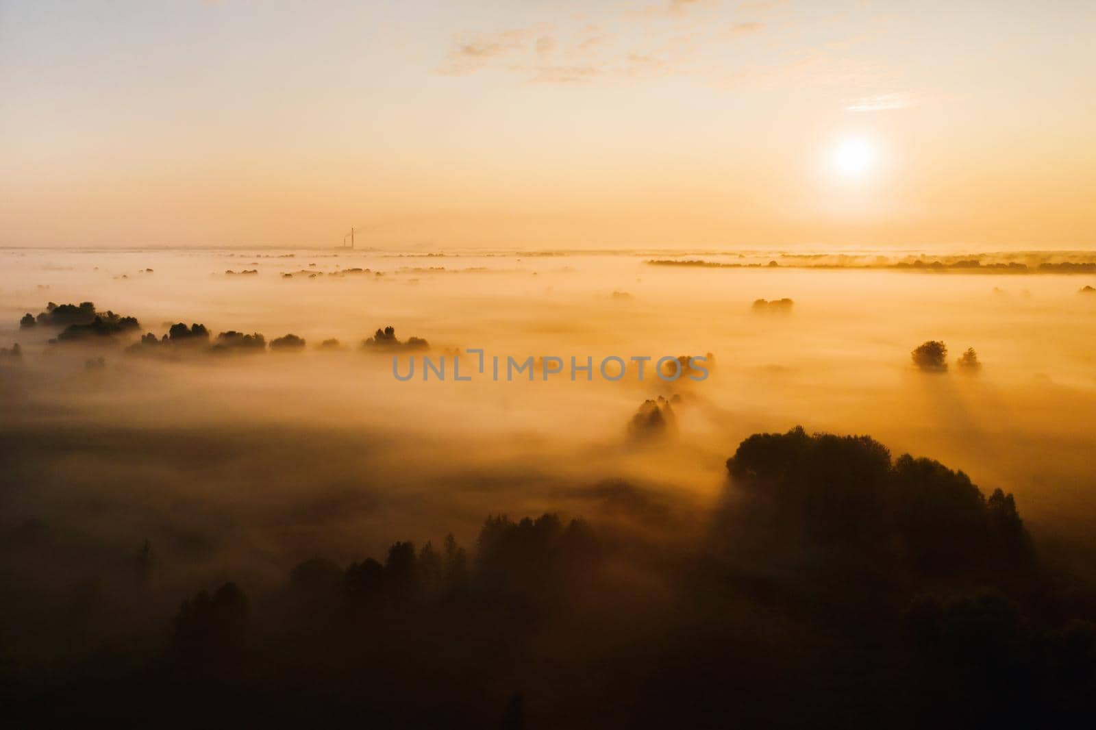 amazing sunrise in the countryside over forest expanses and fields. Amazing dawn in Ukraine and heights.Taking photos from a nature quadcopter by Lobachad