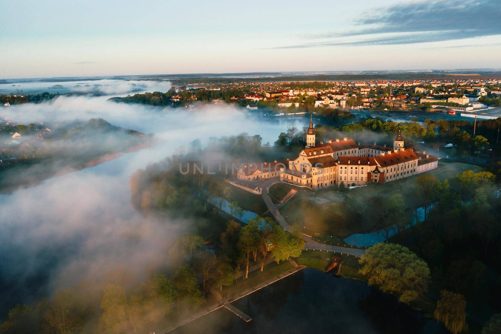 Nesvizh castle is a residential castle of the Radziwill family in Nesvizh, Belarus, with a beautiful view from above at dawn by Lobachad