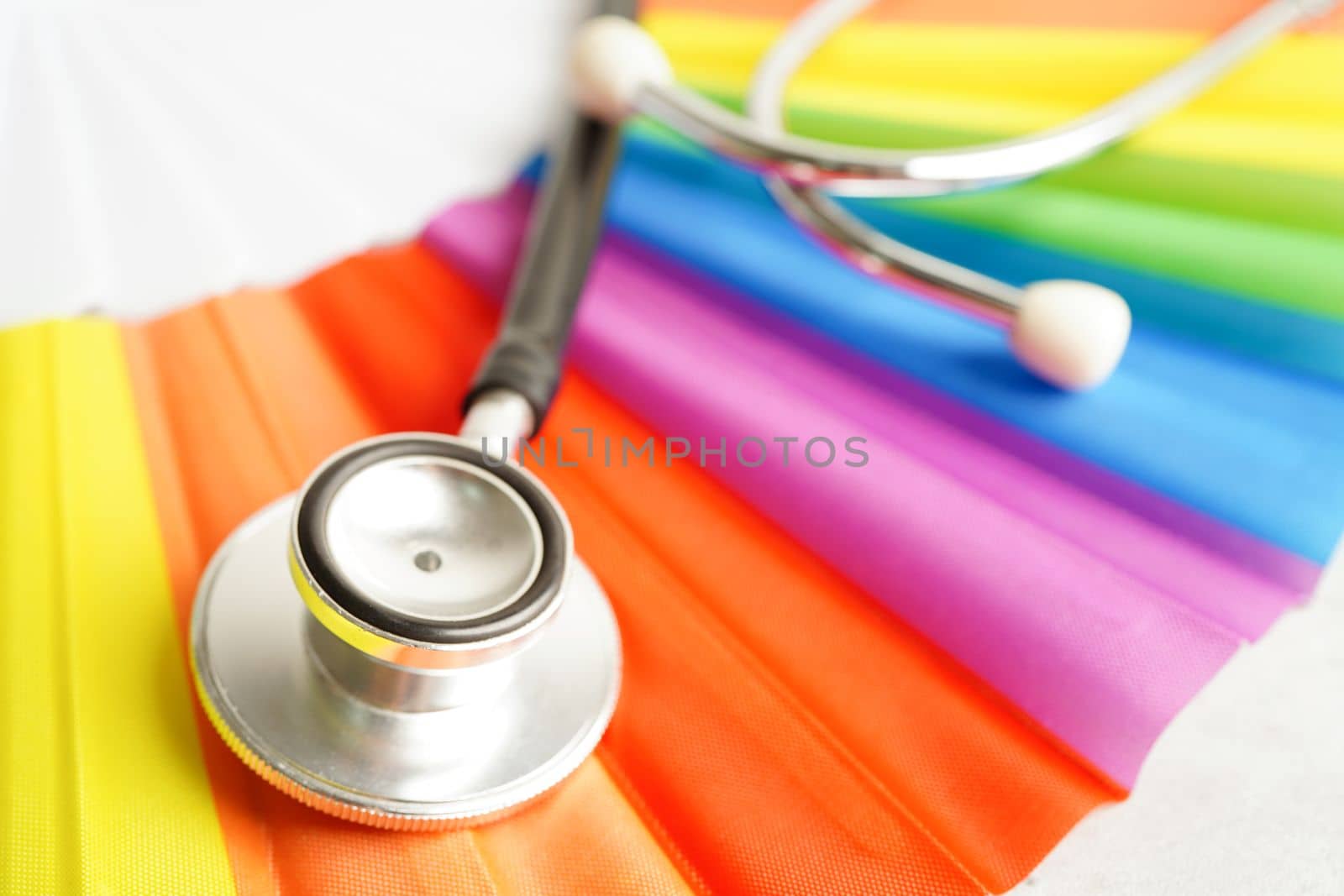 LGBT symbol, Stethoscope with rainbow ribbon, rights and gender equality, LGBT Pride Month in June. by sweettomato