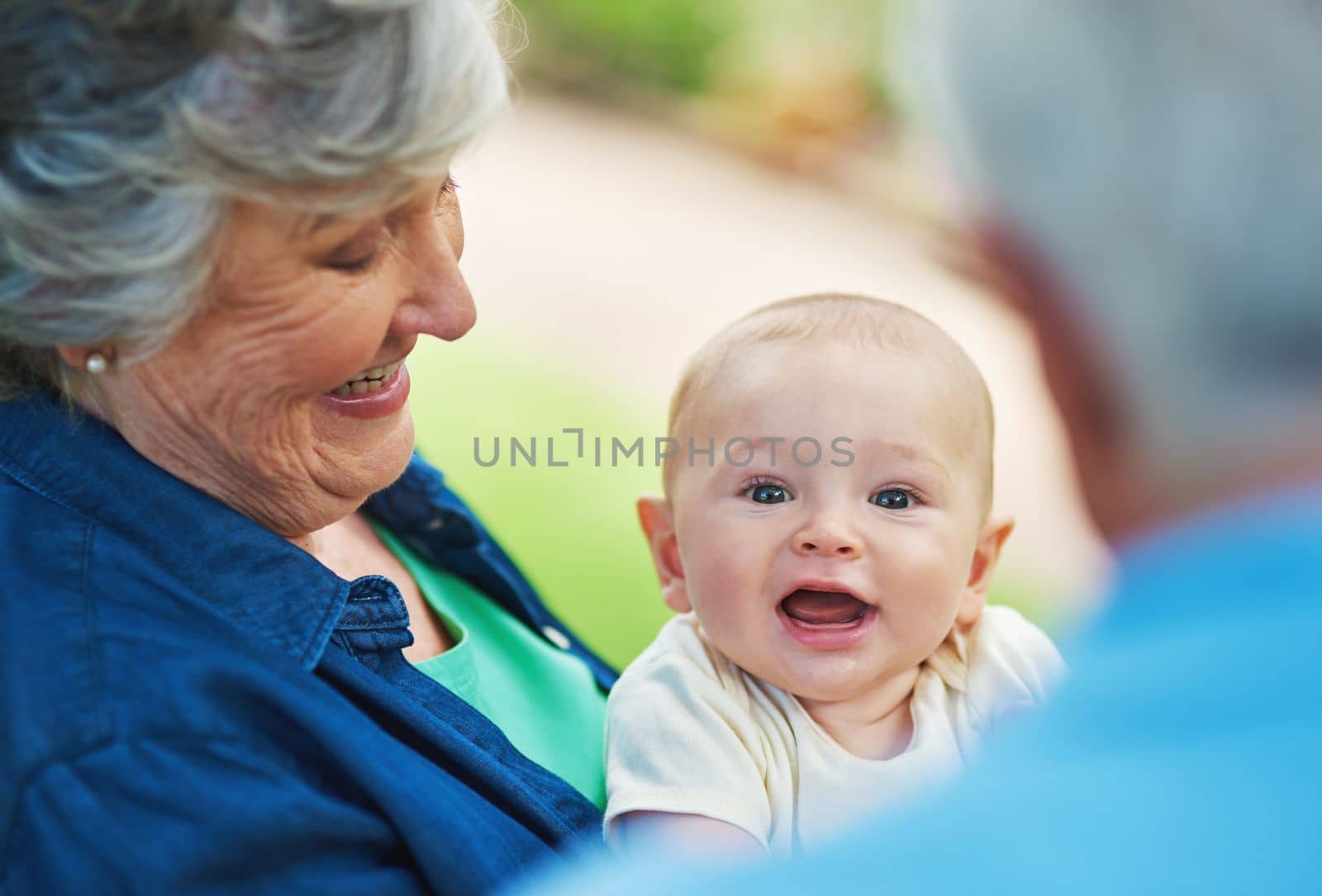 Grandma is crazy in love with me. a baby boy spending time outdoors with his grandmother