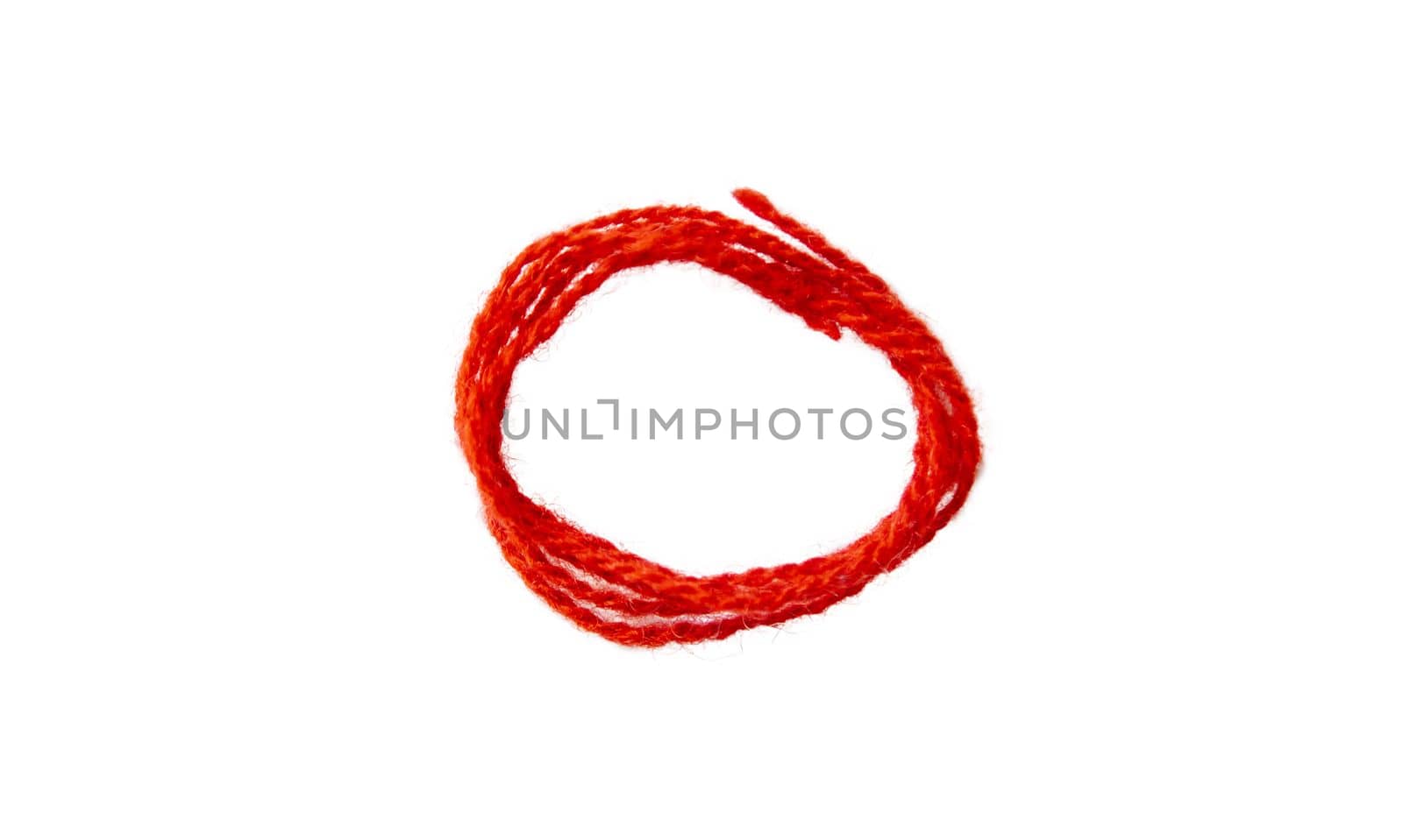 Red thread isolate on white background. Selective focus. by yanadjana