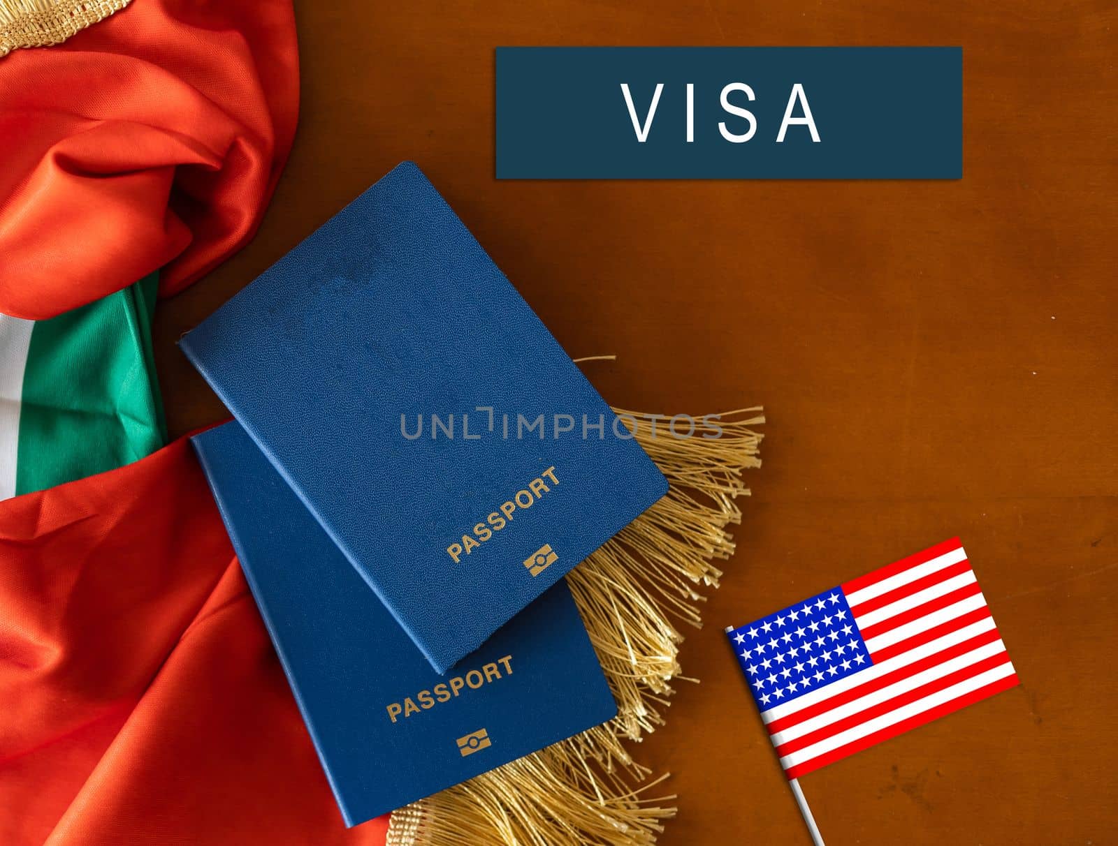 Flag of United States with passport and toy airplane on wooden background. Flight travel concept by Andelov13