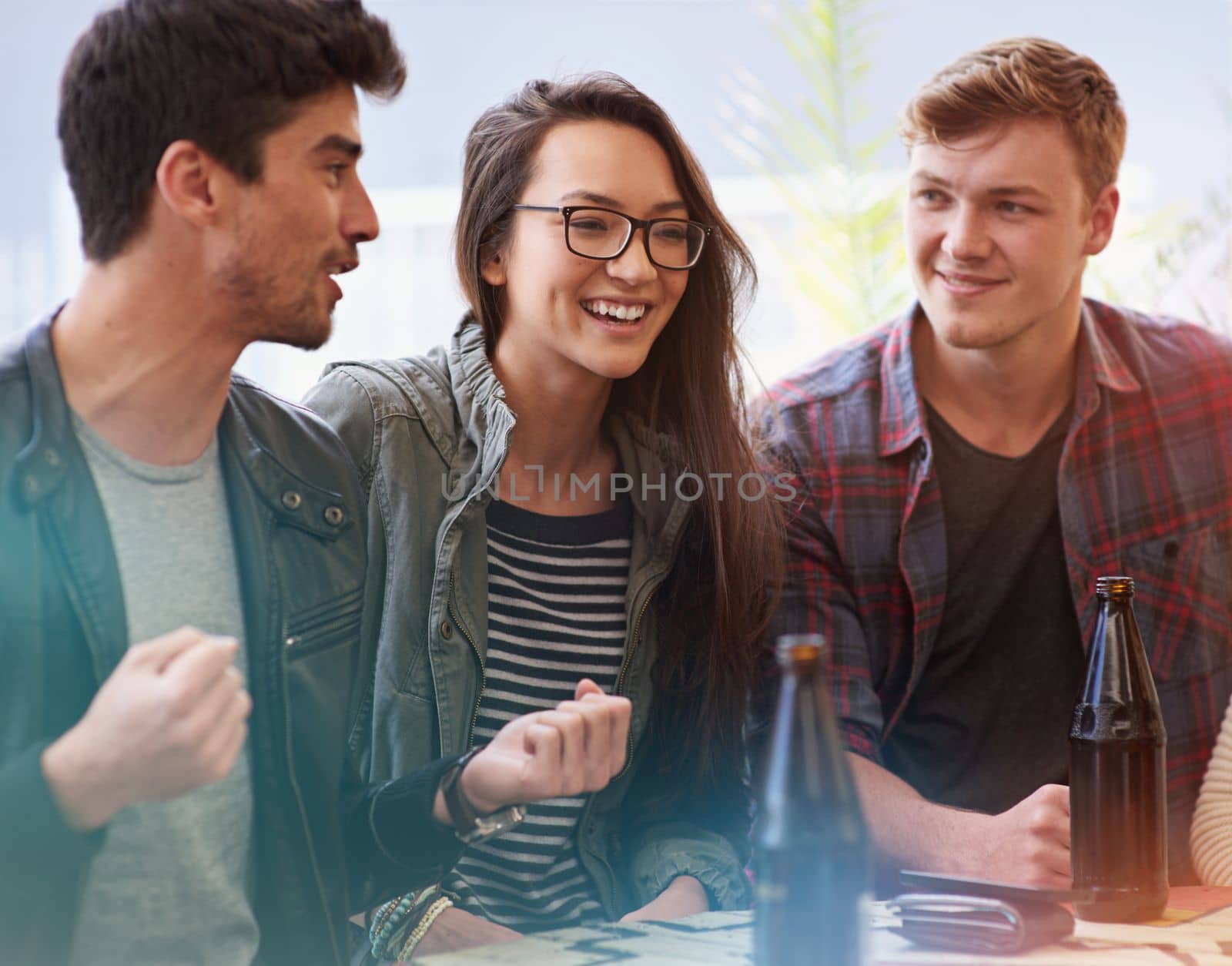 Drinking buddies. a group of friends drinking outdoors