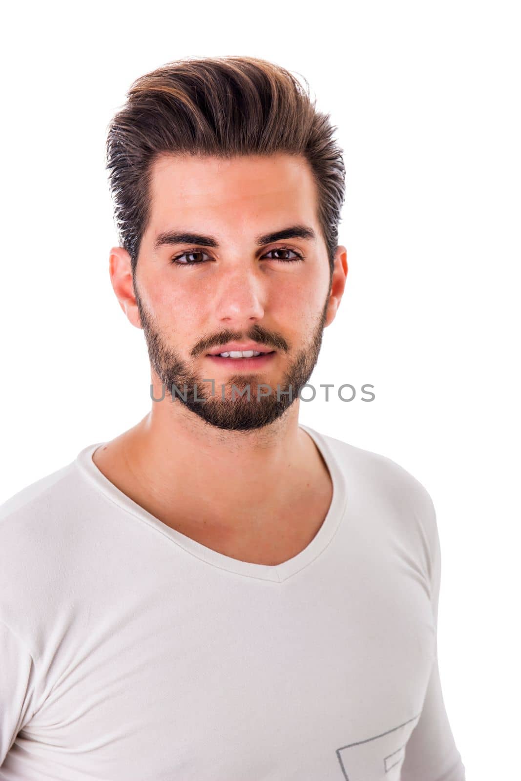 Handsome young man standing with white shirt, half length body shot, isolated