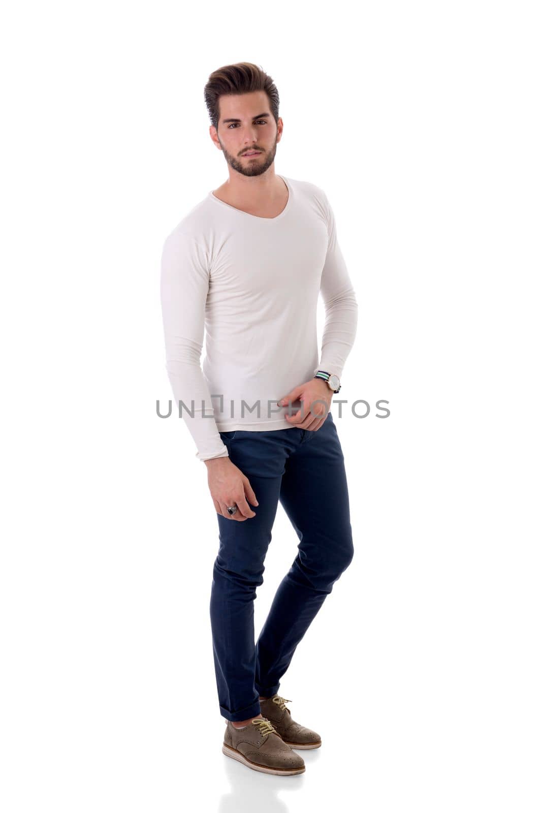 Handsome young man standing with white shirt, full length body shot, isolated