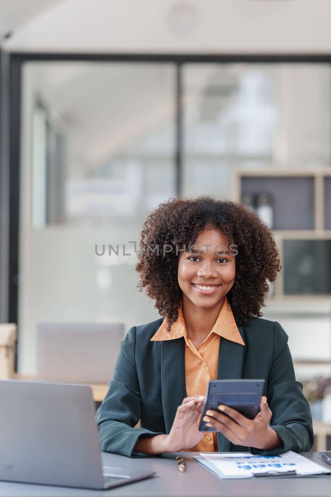 Accountant black woman working on laptop and do document, tax, exchange, accounting and Financial advisor concept.