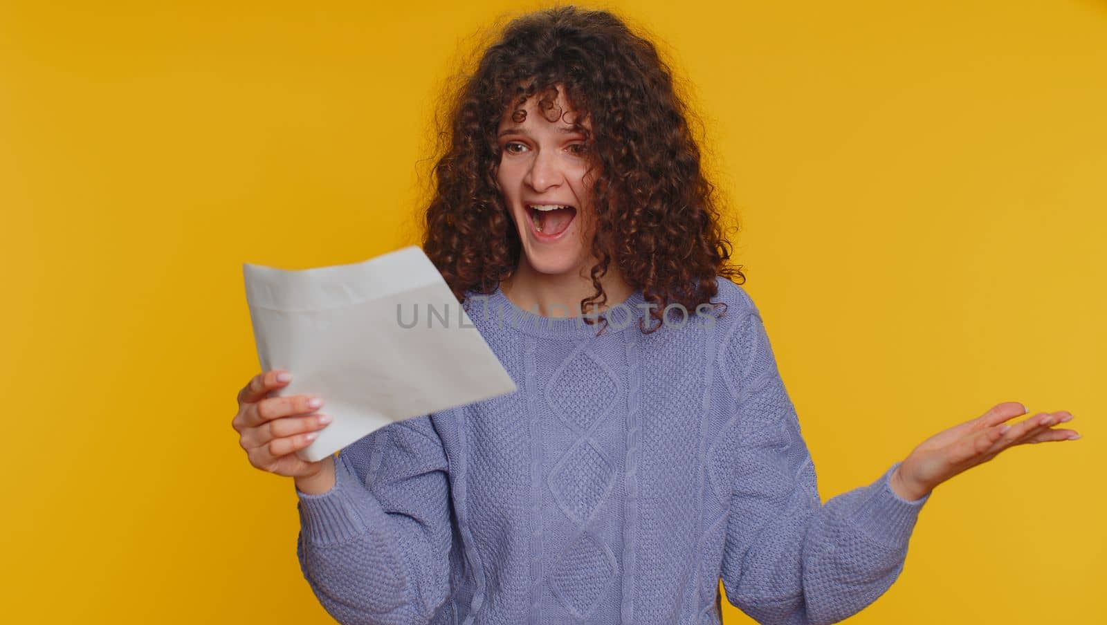 Young student woman open envelope take out letter reads it feel happy. Teen girl career growth advance promotion, bank loan approve, monetary award, long-awaited invitation great news, lottery win