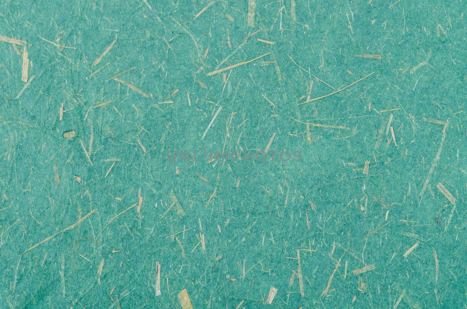 Handmade recycled green colour paper background.