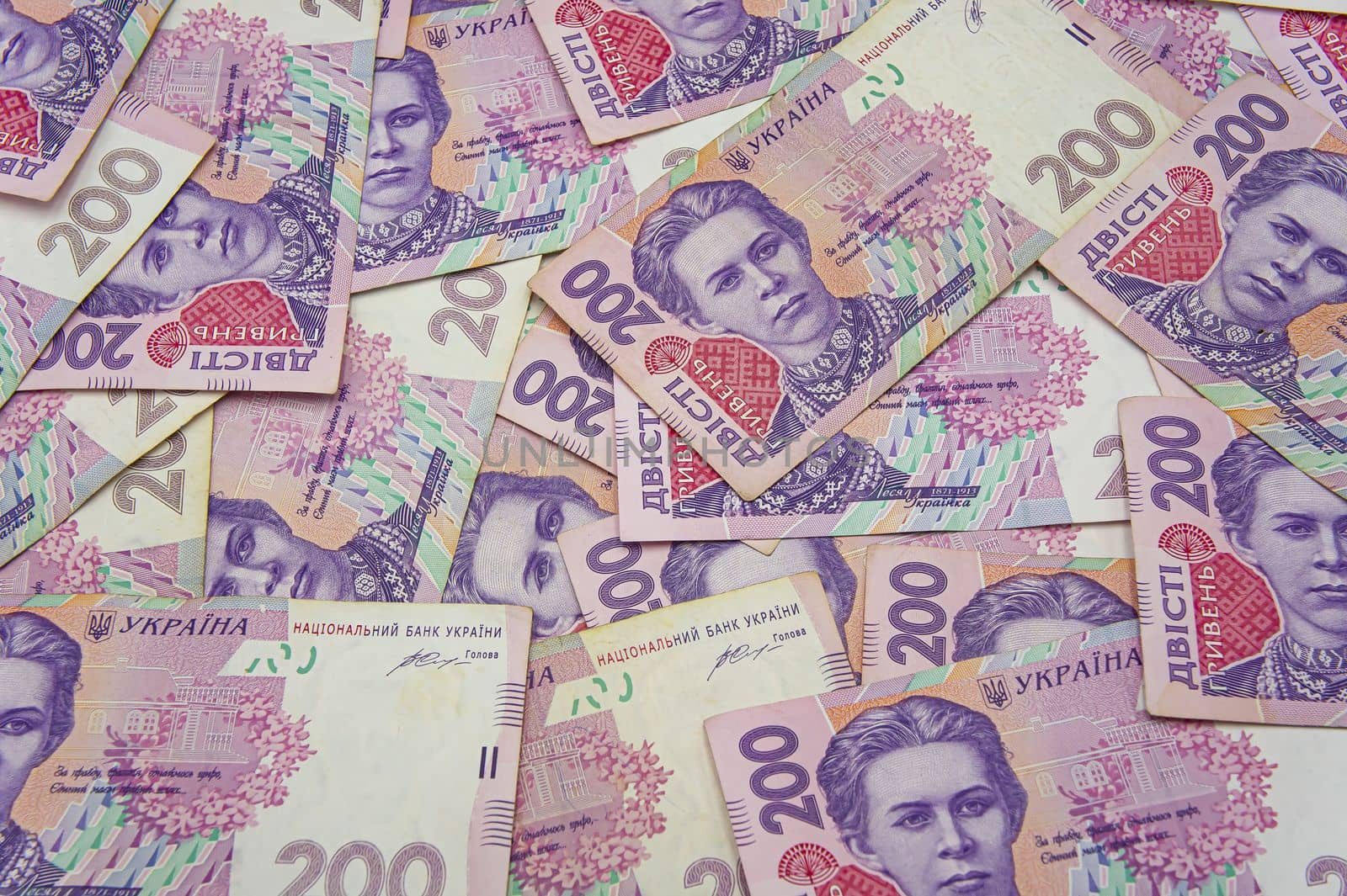 Ukrainian money background. banknotes with a face value of 200 hryvnia money background. Ukrainian money. Business concept. Background with hryvnia. by mr-tigga