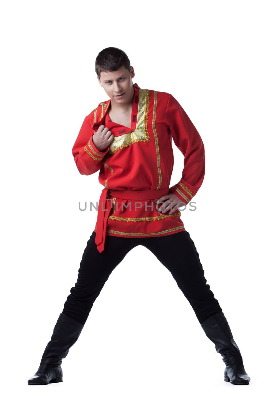 Full length portrait of sexy dancer in russian costume. Isolated on white