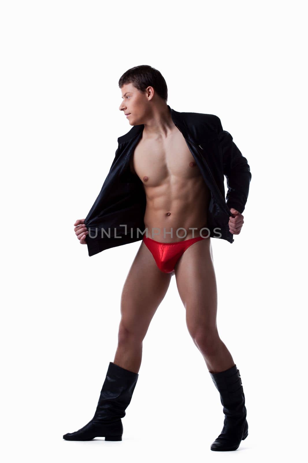Full length portrait of young stripper in black jacket. Isolated on white