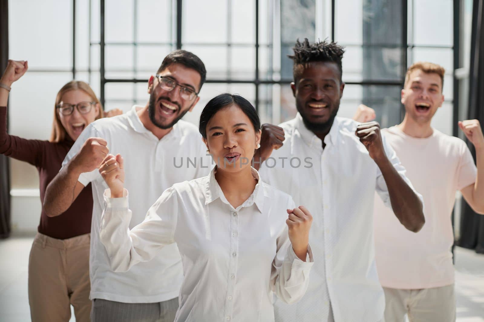 Business people looking at the camera during a business meeting in a modern office