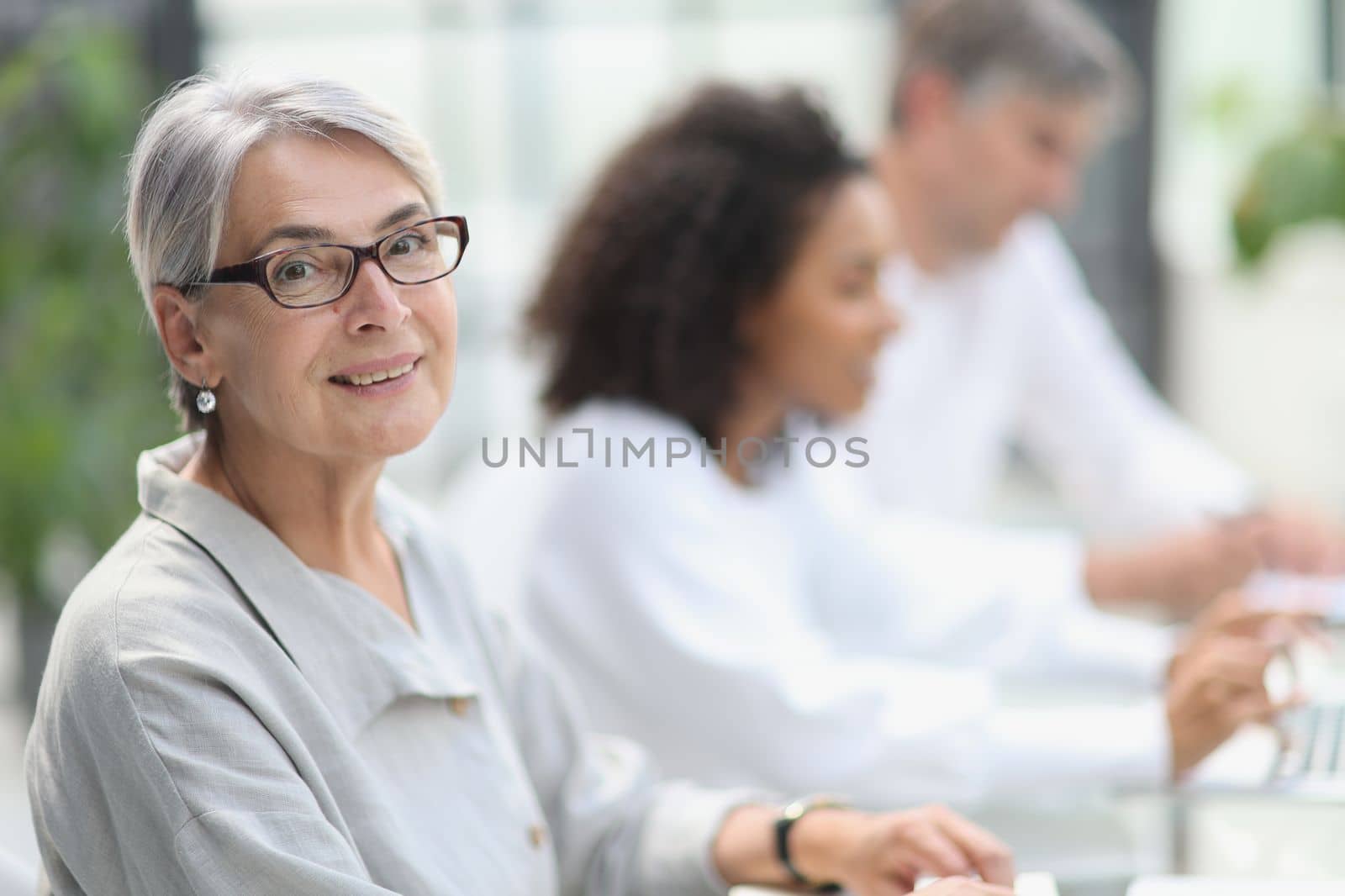 portrait of a mature woman during a break in the office.