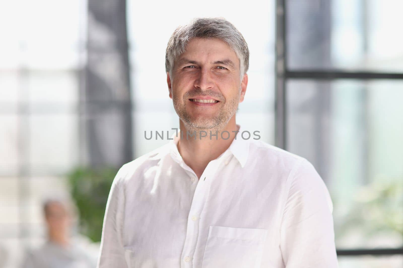 portrait of a successful business man. businessman smiling and looking at camera