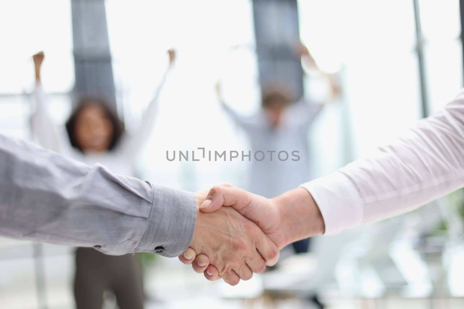 Businessman handshake for teamwork of business merger and acquisition by Prosto