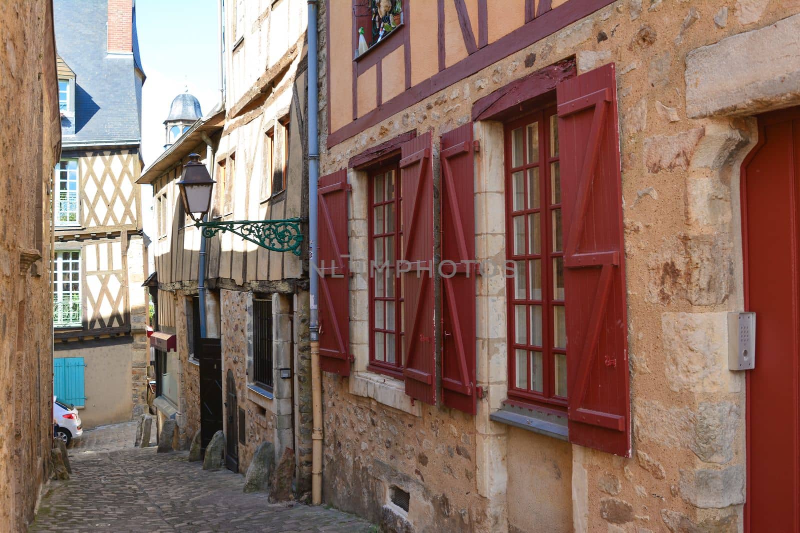 Narrow streets with medieval half-timbered houses at a Le mans