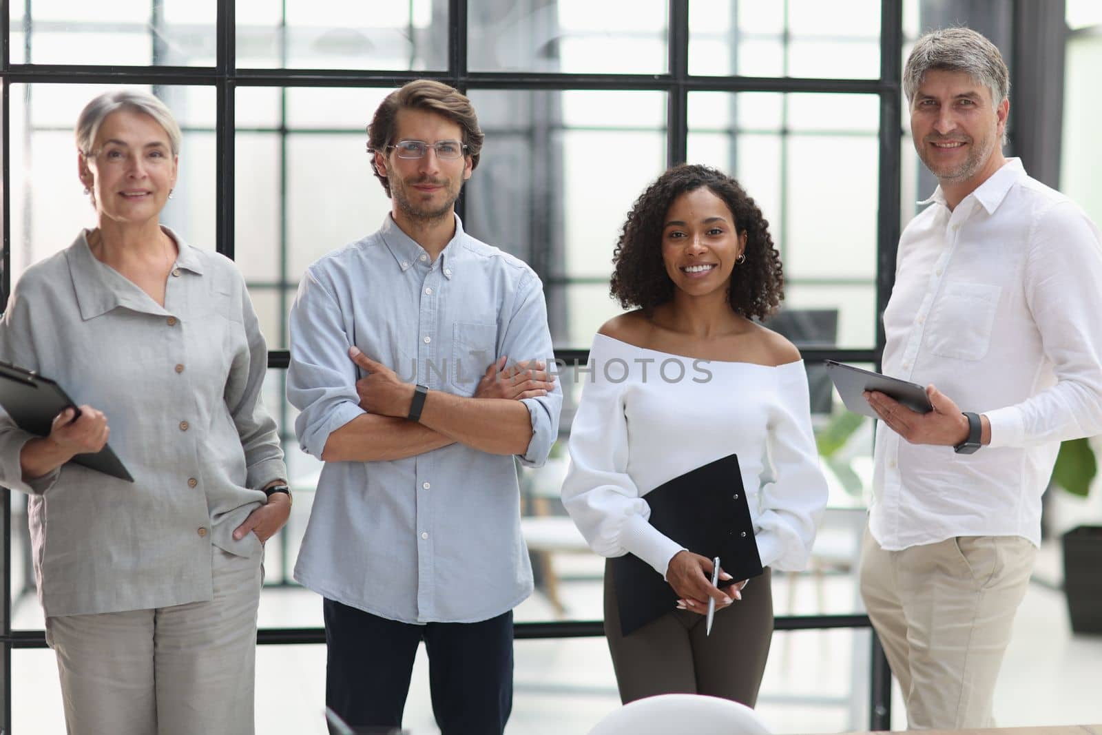 A group of young modern people in smart casual clothes