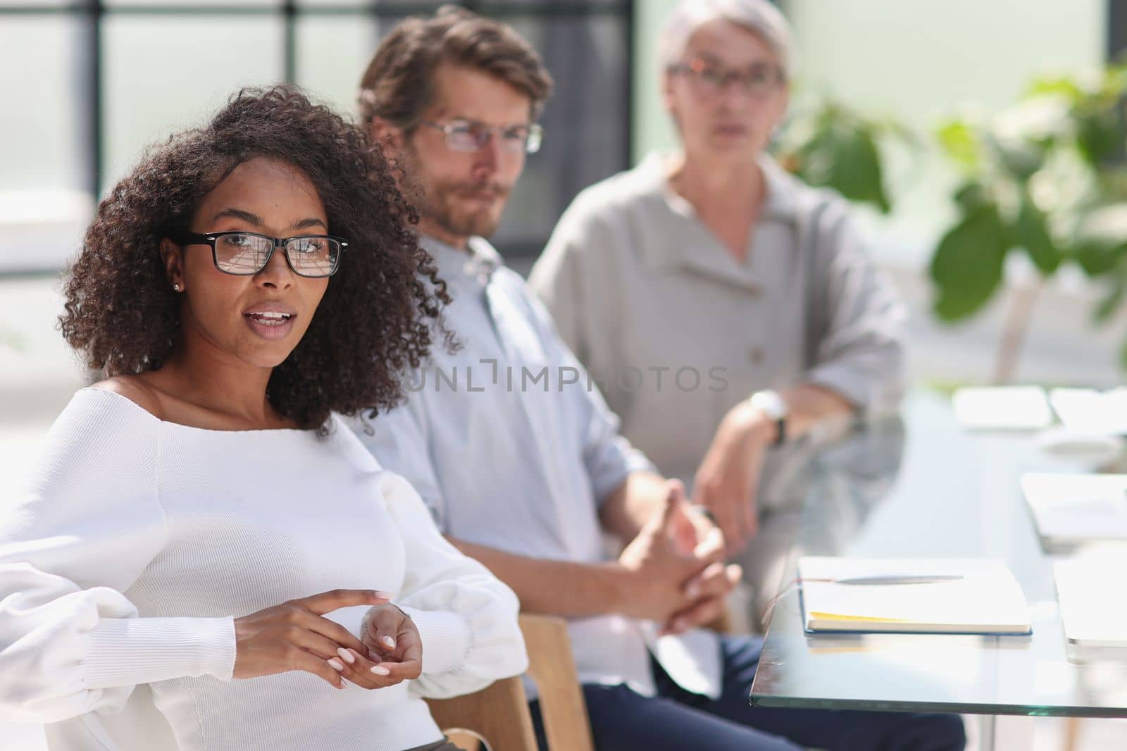 portrait of a young african american woman in the office