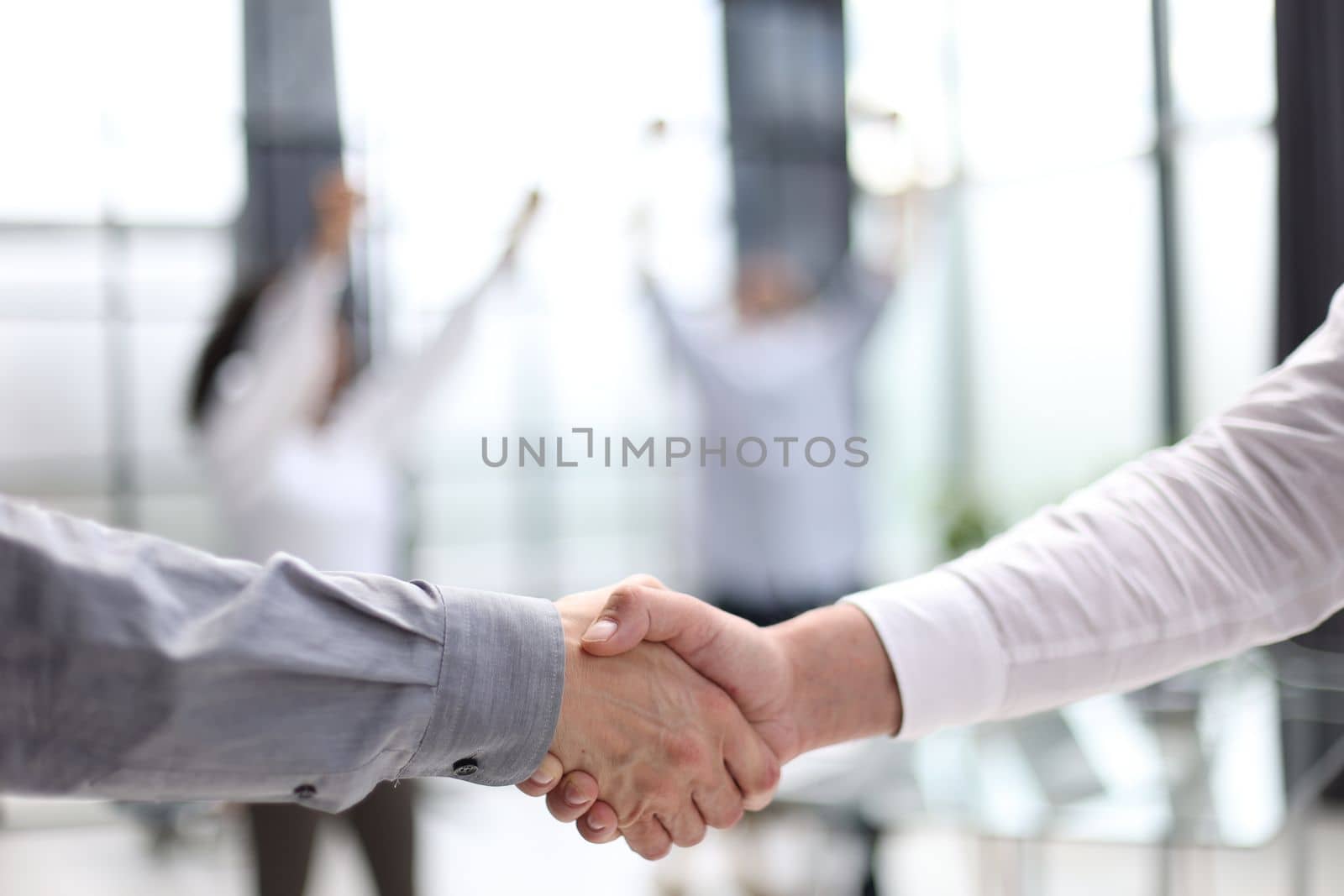 Businessman handshake for teamwork of business merger and acquisition by Prosto