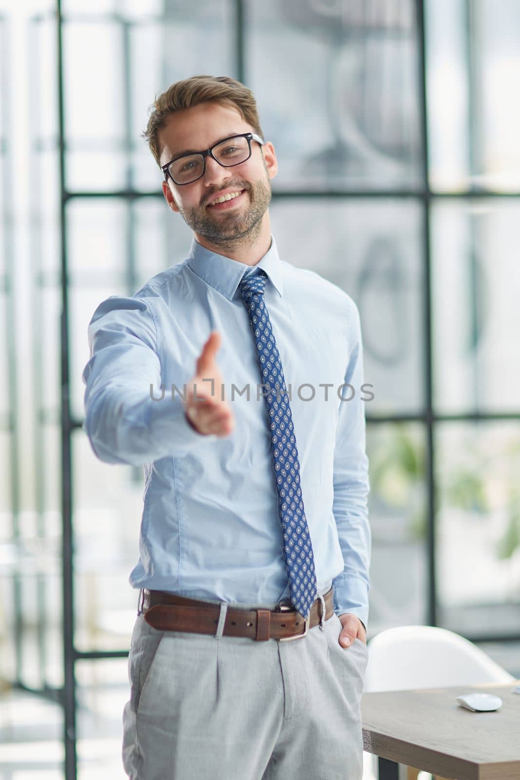 Businessman With Open Hand Ready For Handshake