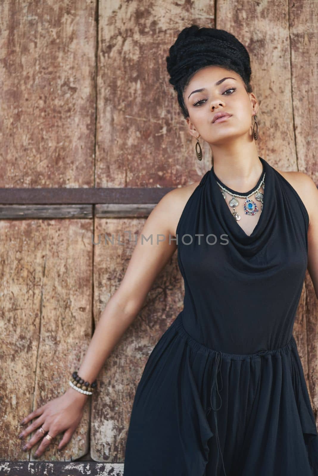 You like me style. Portrait of an attractive young woman posing outdoors. by YuriArcurs