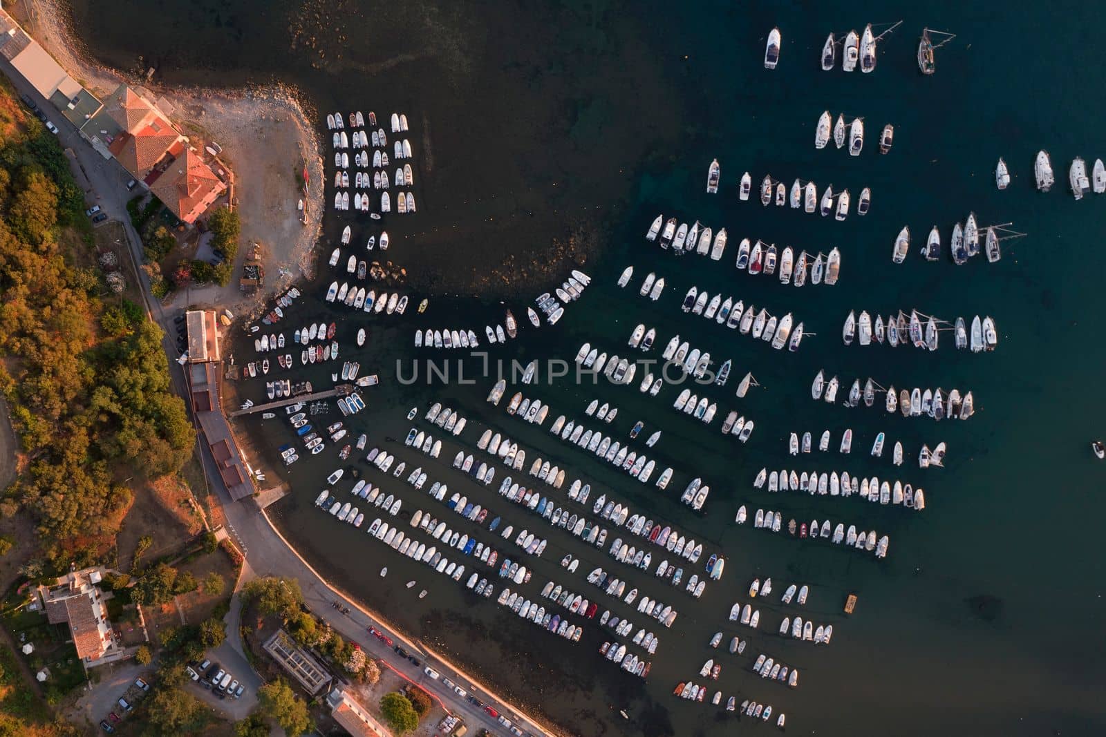 Aerial view of the small port of Baratti at the first light of dawn  by fotografiche.eu