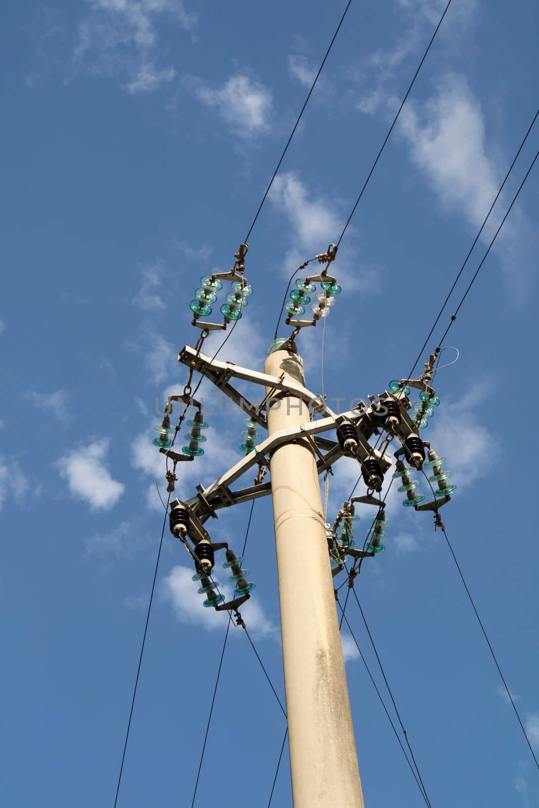 Poles for the distribution of electricity for civil use  by fotografiche.eu