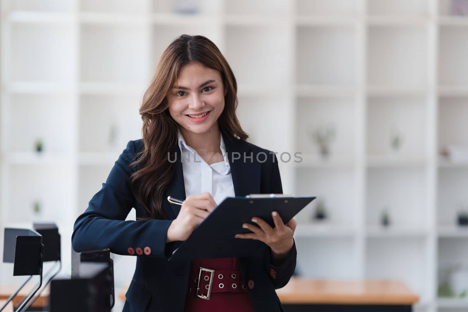 Smart business people working together with financial data in the digital tablet at co working space. finance and account concept.