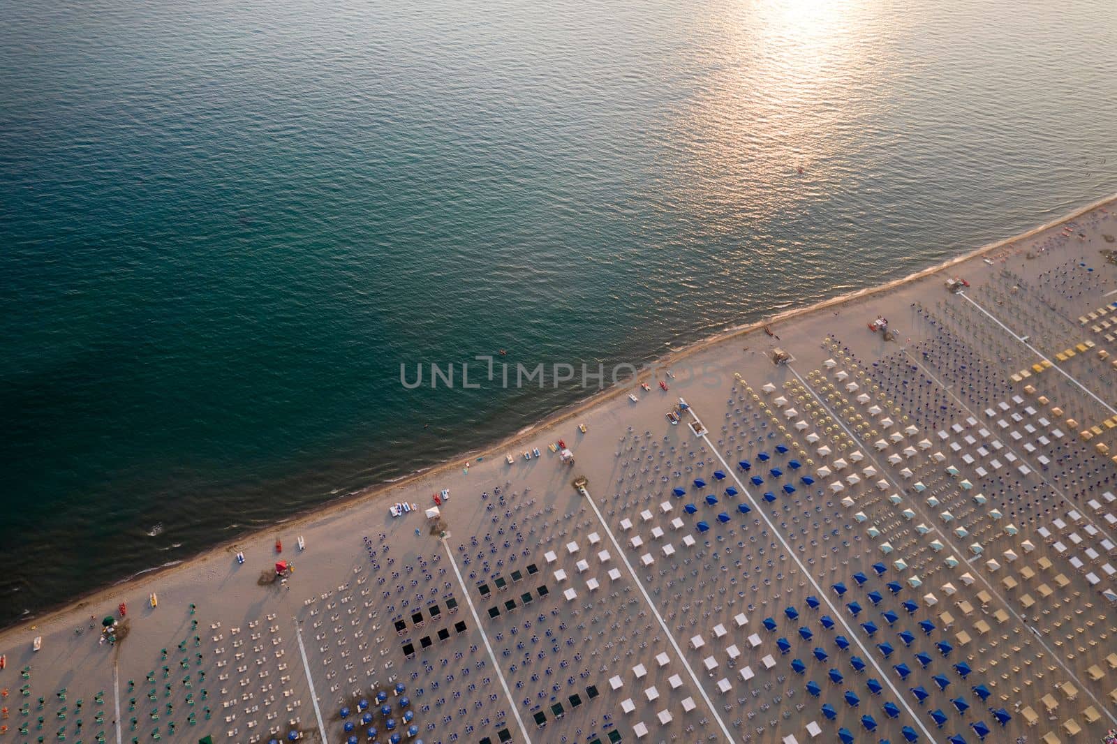 Aerial view of the equipped beach of Viareggio Tuscany photographed in the late afternoon 