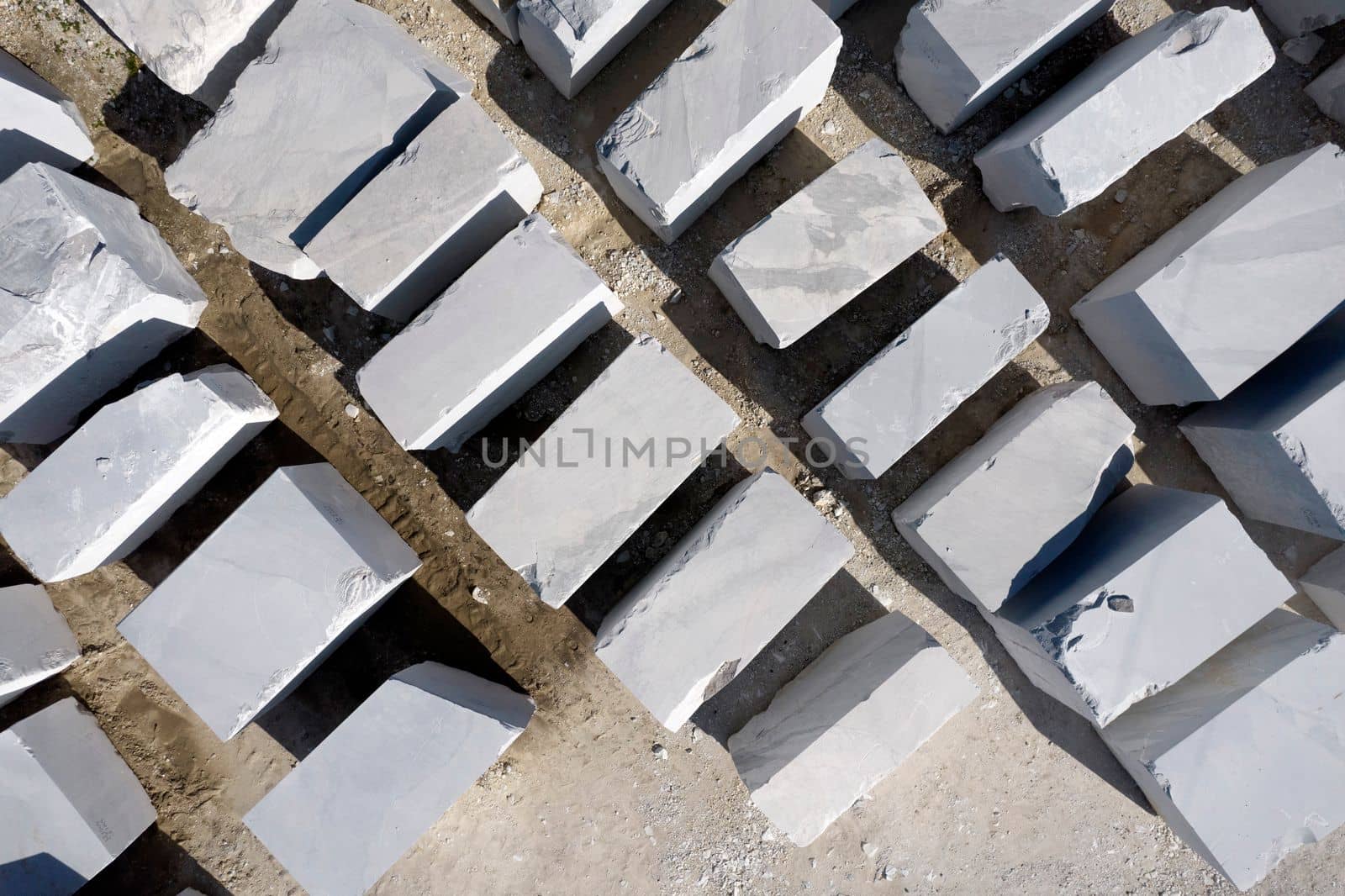 Aerial view of a deposit of marble blocks by fotografiche.eu